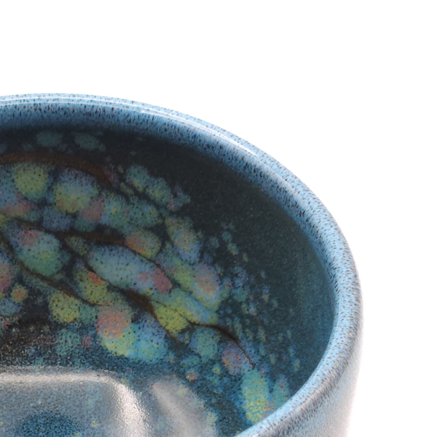 Authentic Japanese pottery teacup with tree pattern decoration. blue color. (top detail view 1).