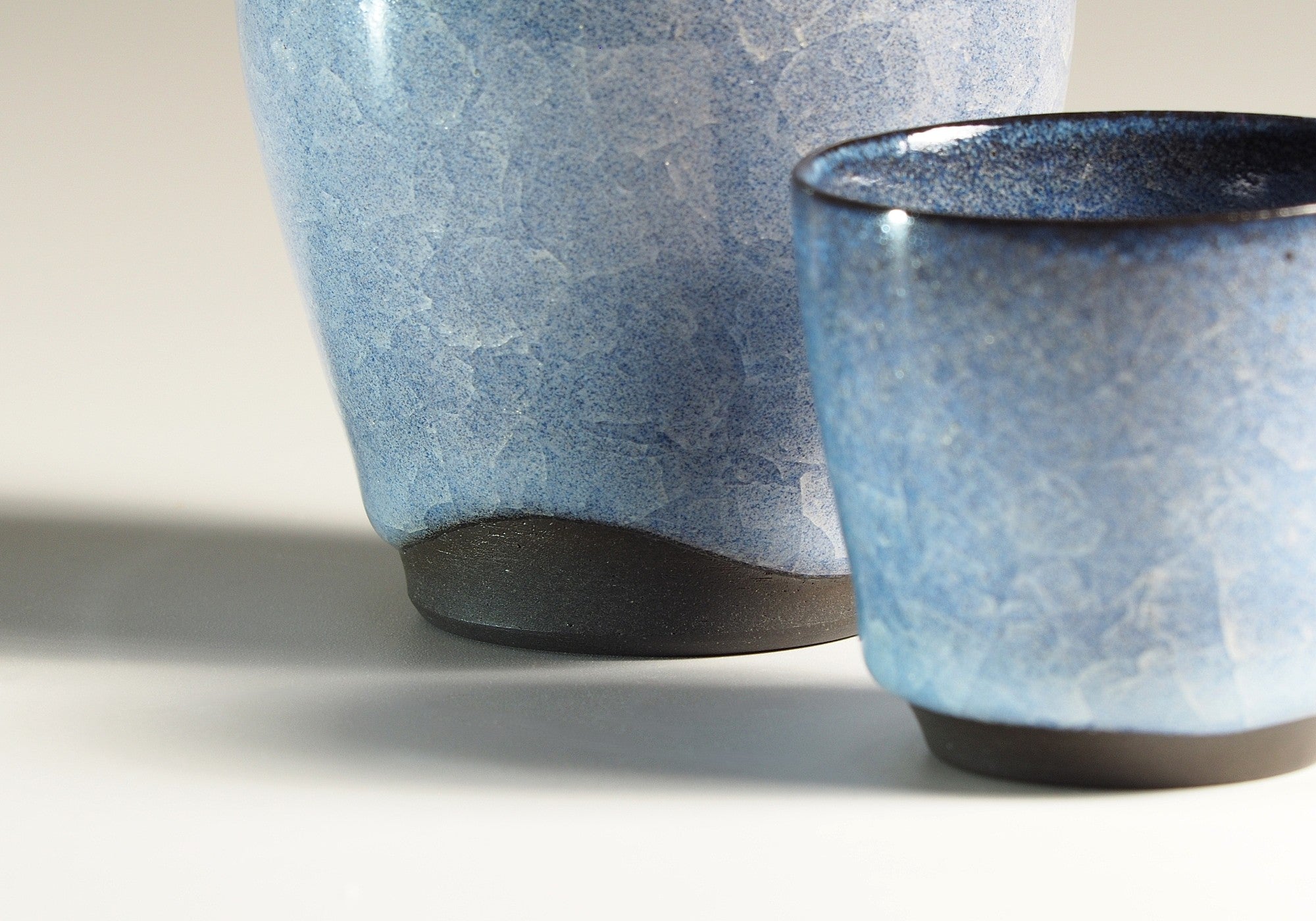 Handmade Japanese pottery crazed design Tokkuri and Sake cups background beige zoom, Tsukushi