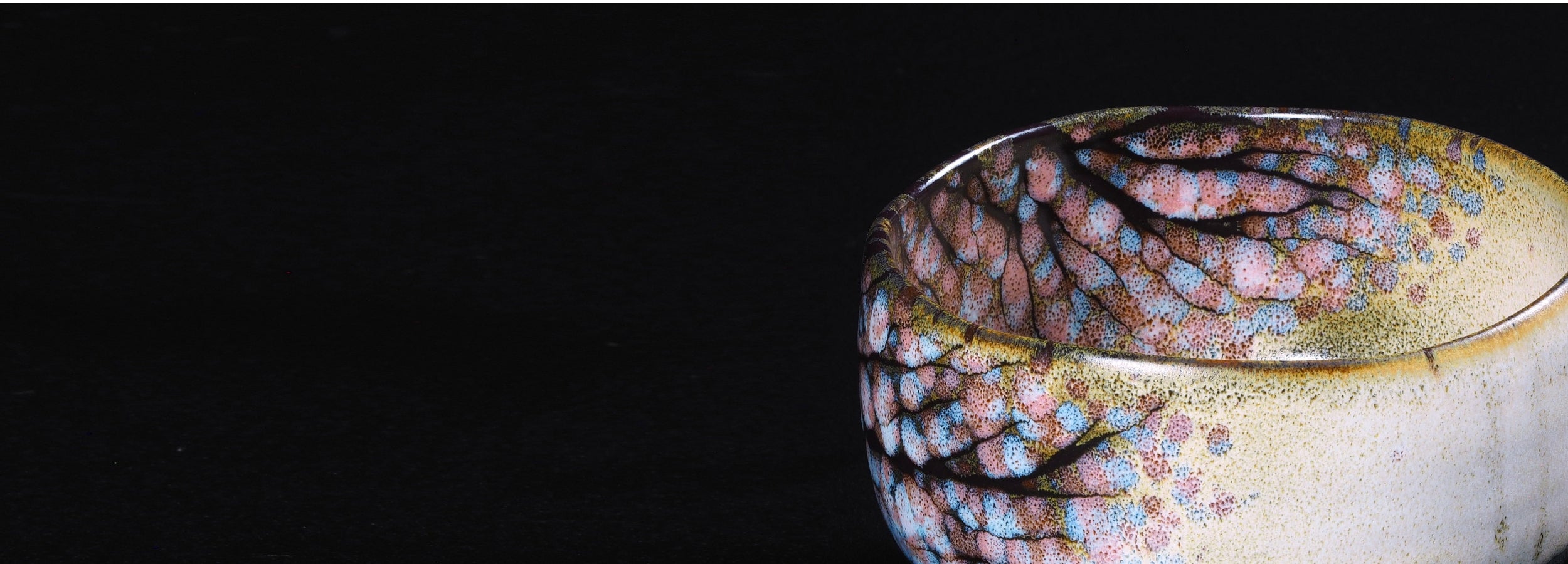 Close-up of a japanese matcha bowl on a black background