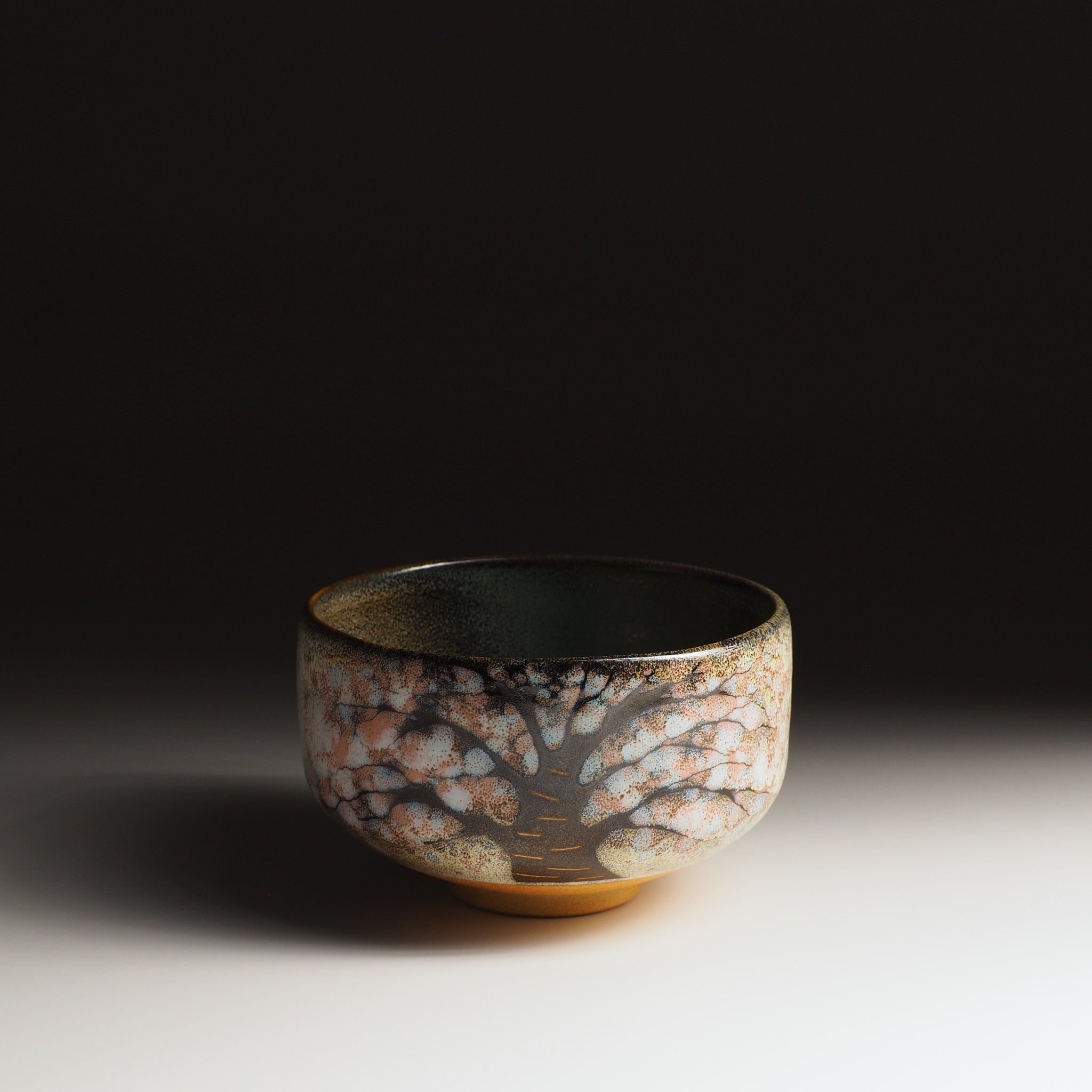 Hanagumo matcha bowl, full sakura tree glaze painting, charcoal and blush, Nunobiki Kiln Japan