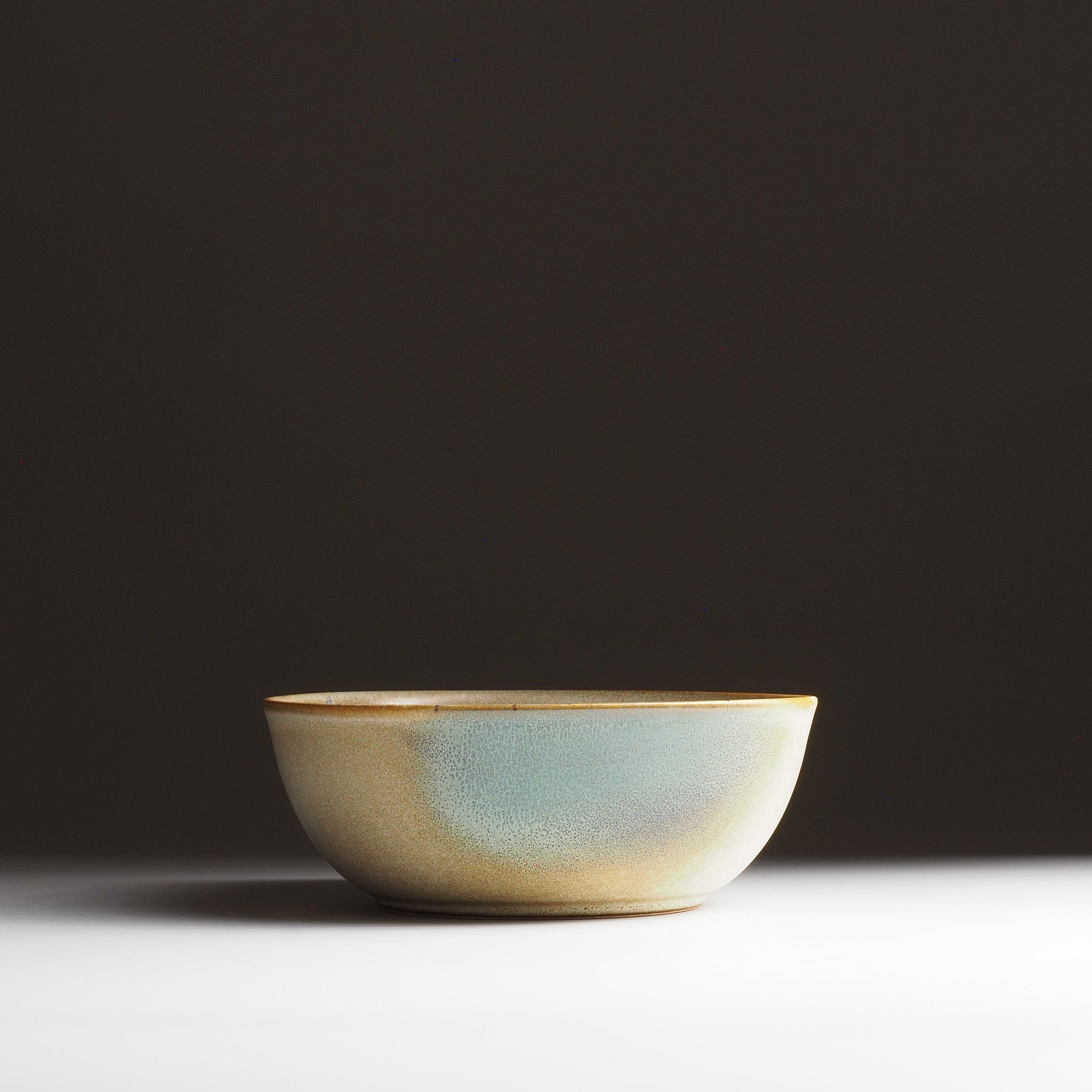Harukaze Japanese Salad green bowl by artist Kazuhiro Kojima. Full rontal view on a gradient background.