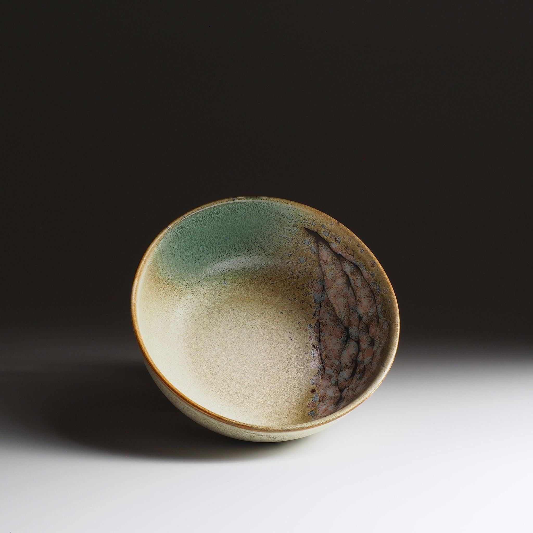 Harukaze Japanese green salad bowl by K.Kojima. Inside view, gradient background.