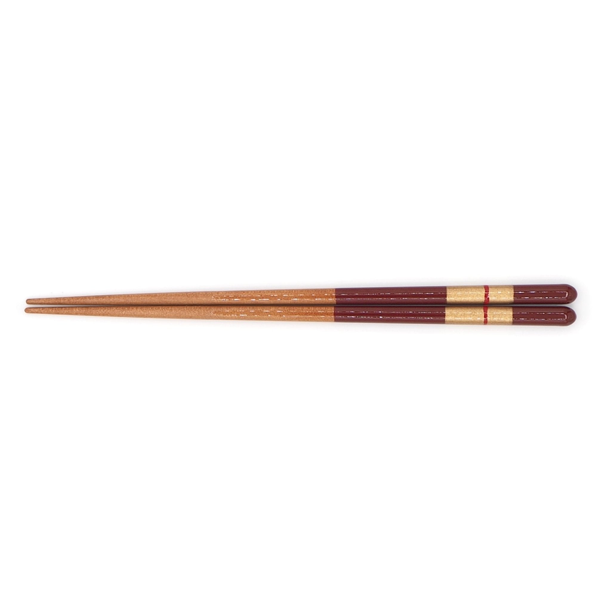 Top view of red Japanese Chopsticks   with golden motif 