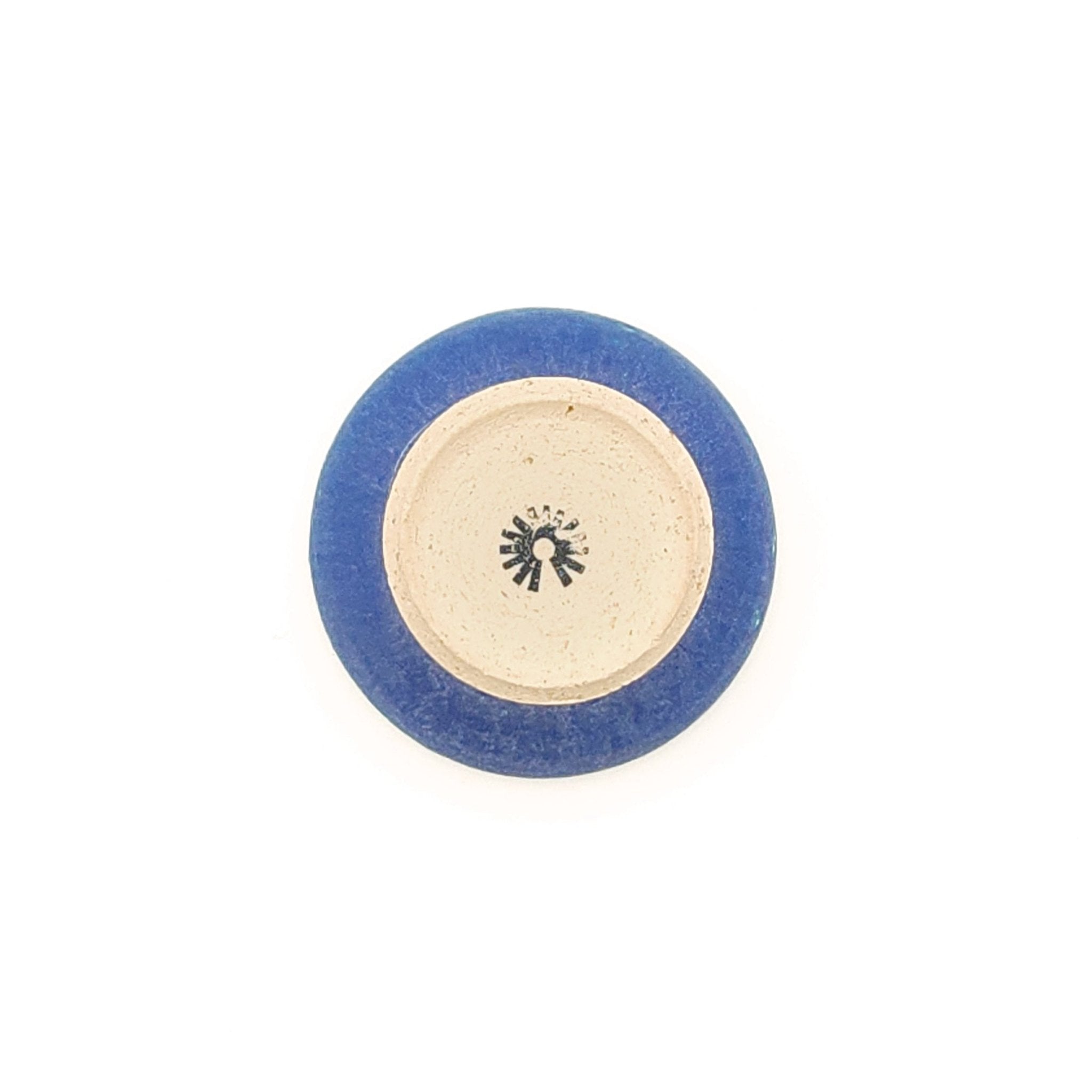 Bottom view of a turquoise Japanese pottery small cup