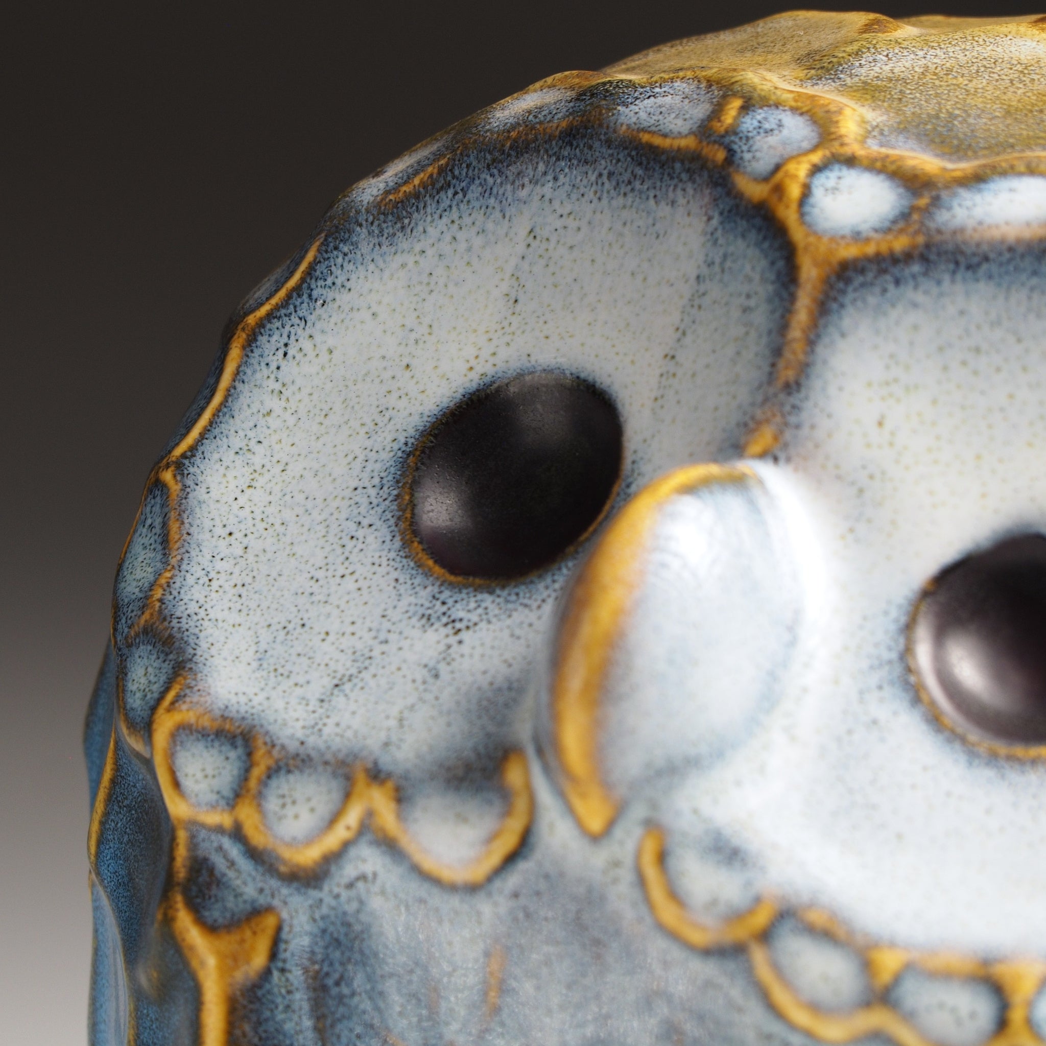 Large Fukumori owl figurine, Kazuhiro Kojima, handcrafted in Japan, side face detail, cerulean Nanasai Tenmoku glaze, Tsukushi.