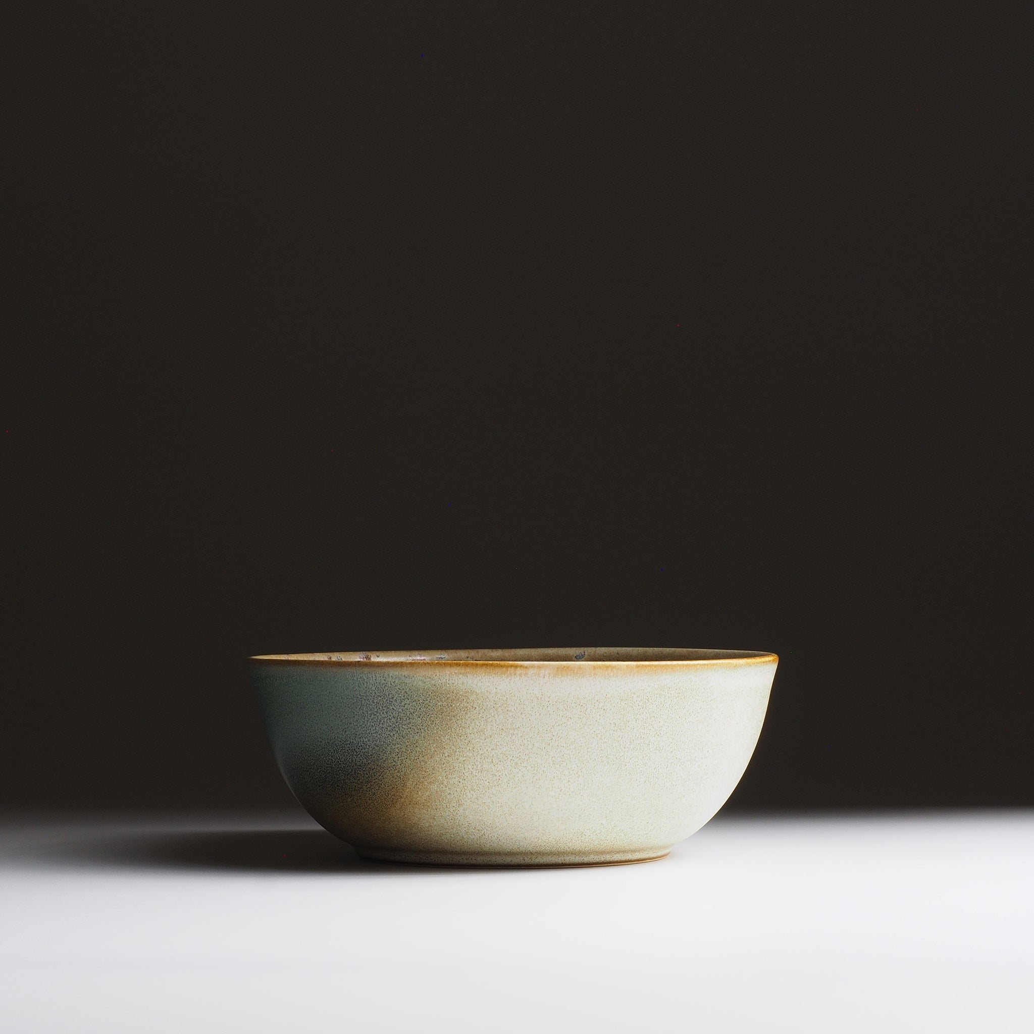 Front view of the Harukaze Japanese Salad green bowl by artist Kazuhiro Kojima