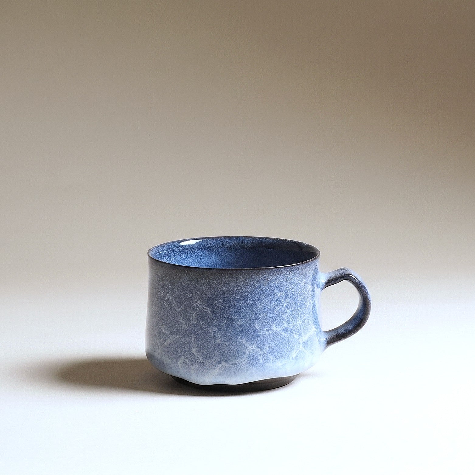 Japanese ceramic coffee cup with glaze drip